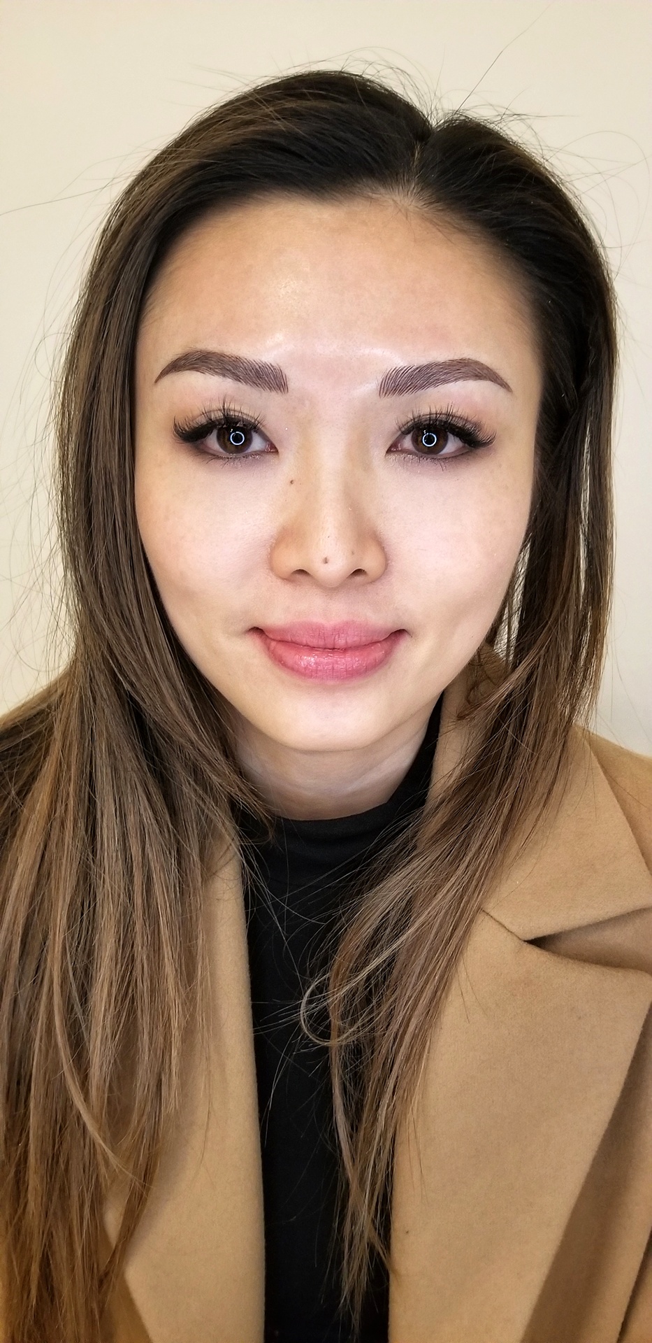 Close-up of finished brow tattoo