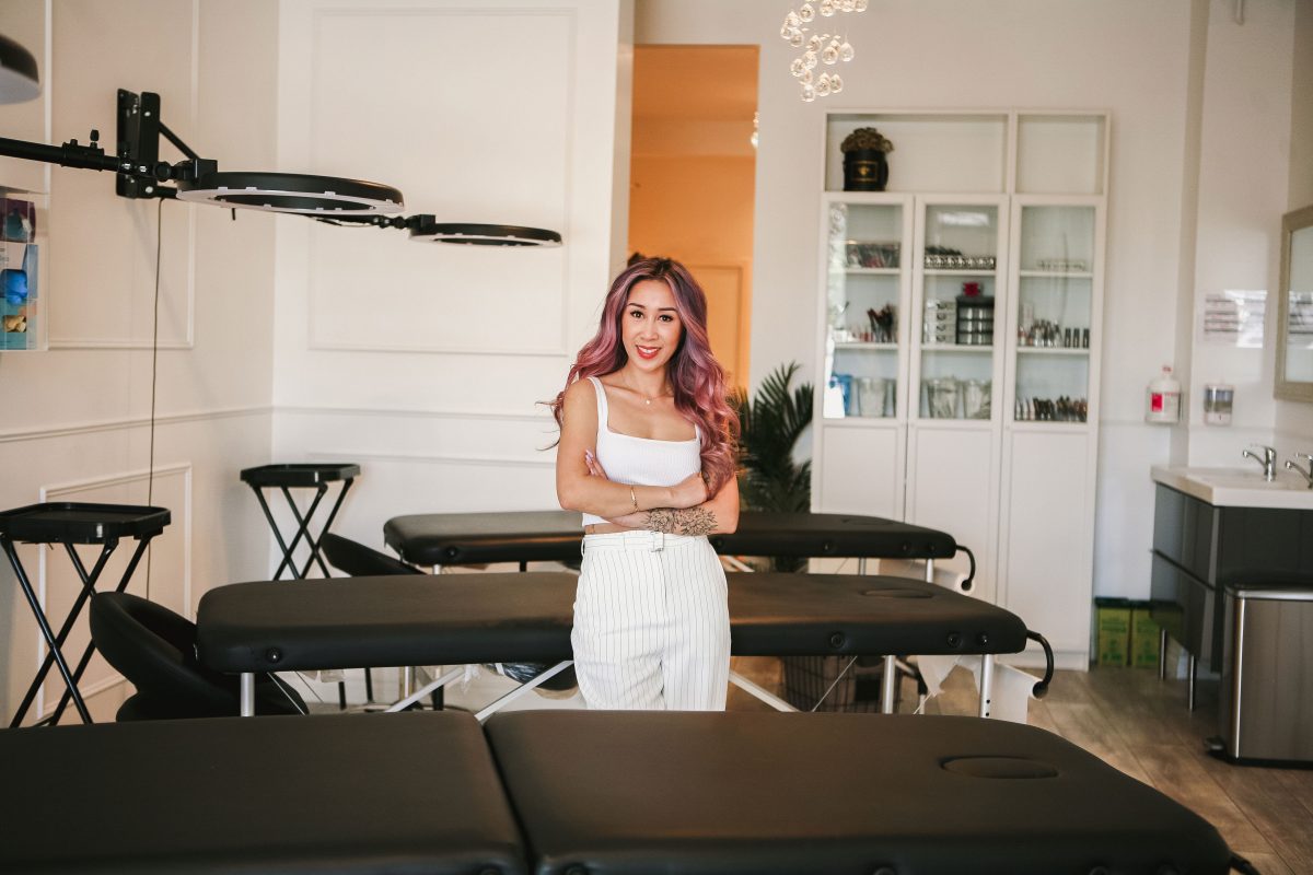 Founder standing inside Inkspiration studio