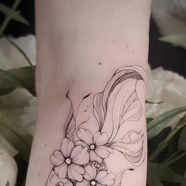 Fine-line body tattoo