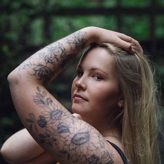 Fine-line body tattoo