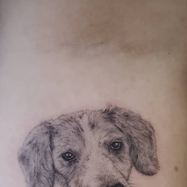 Fine-line body tattoo